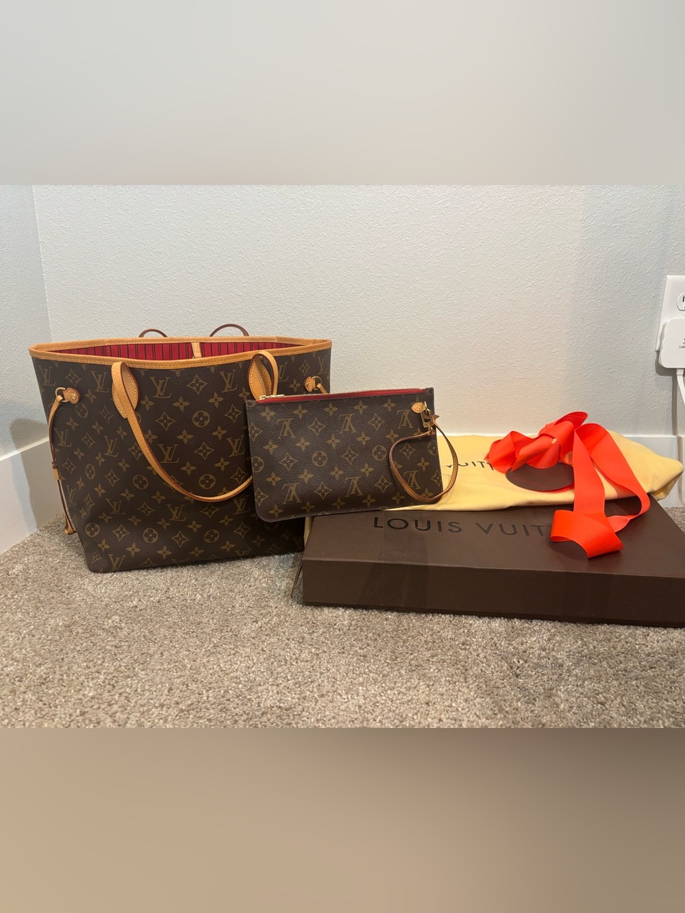 Louis Vuitton Neverfull monogram tote with wristlet-red interior